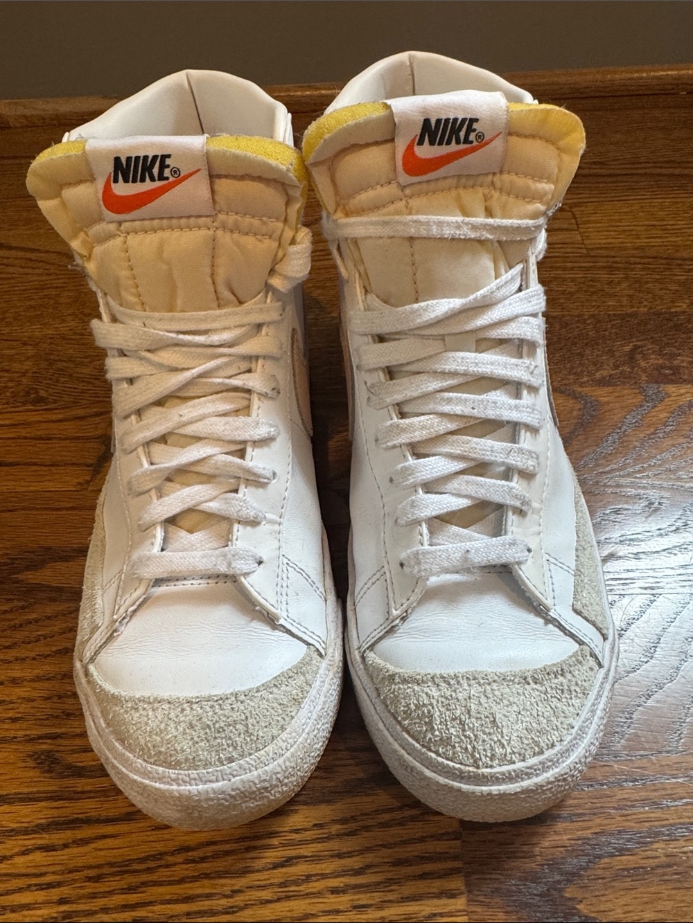 Nike White High-Top Sneakers with Blush Logo Accents